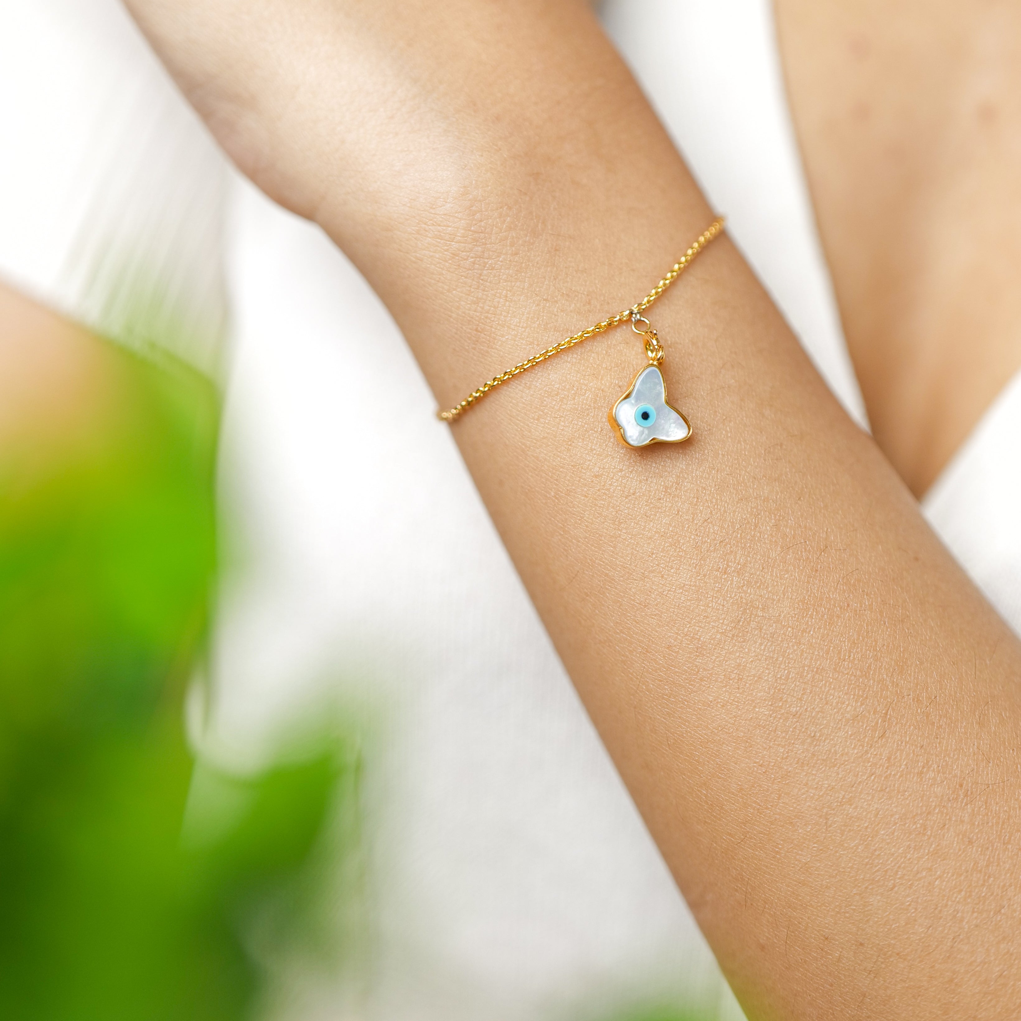 Butterfly Charm Evil Eye Bracelet